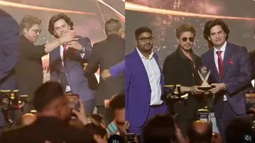 Shah Rukh Khan stops fan during on-stage selfie attempt, netizens defend his move; watch