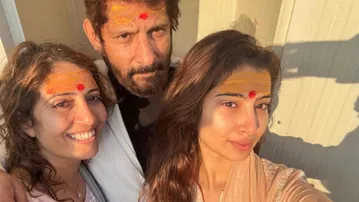 Sara Arjun with her parents