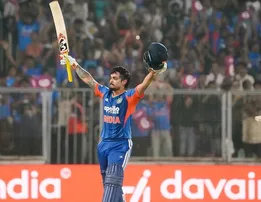 Ishan Kishan celebrates after scoring century