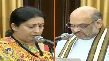 Shah, Irani take oath as Rajya Sabha members