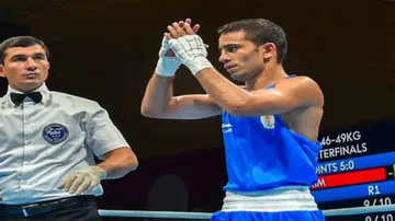 Don't want award for myself, but please honour my coach: Amit Panghal