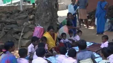 Sans infrastructure, Anganwadi centre functions under tree in Keonjhar