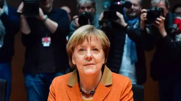 Merkel likely to win, predict pre-poll surveys