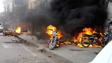 CAA Protests Turn Violent In UP: Vehicles Torched, Cops Attacked