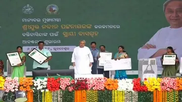 Odisha CM distributes land 'rights certificates' to slum dwellers