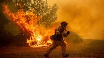 California wildfire explodes in size, largest in state's history