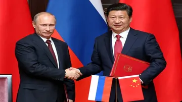 China, Russia play role in world peace, stability