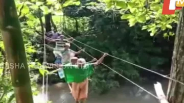 Hanging By A Thread! Without Bridge, Odisha Villagers Cross River Using Electric Cables