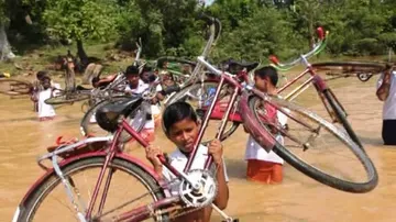 Students in Odisha village still cross river on foot to attend school