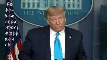 Donald Trump warns to put a hold on WHO funding
