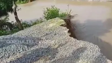 Acres of land submerged as portion of Pattamundai canal embankment collapses