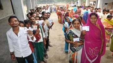 Guj polls: 30.31% voter turnout till noon, EVM glitches