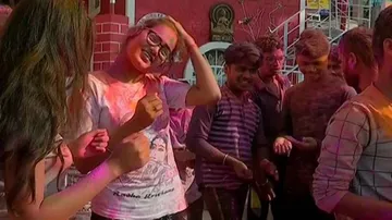 People Across Odisha Soak In Colours Of Holi Amid COVID-19 Scare