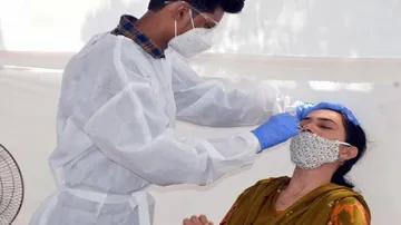 India Reports 67,084 New Covid Cases & 1,241 Deaths