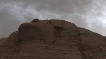 NASA's Mars Curiosity Rover Snaps Shining Clouds On Red Planet