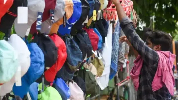With mercury soaring with each passing day, the sale of caps, umbrella, handkerchiefs and sunglasses