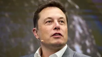 Elon Musk plans 10% staff cut at Tesla, freezes hiring