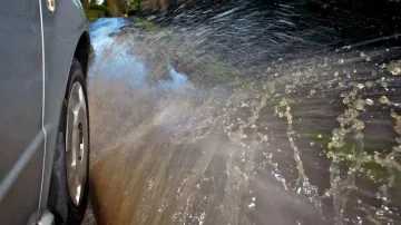 Car Tyre Splashing Water