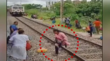 Horrific! Watch passengers cross railway track seconds before speeding train approaches them