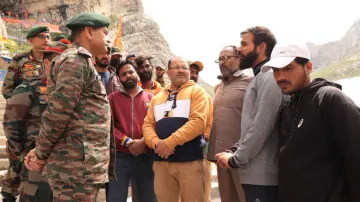 Northern Army Commander interacts with security personnel at Amarnath cave shrine