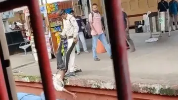 Cop Thrashes Old Man, Hangs Him Upside Down 