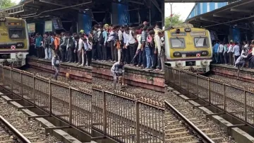  Man risks life to save dog from a railway track