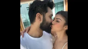 Mouni Roy shares a passionate kiss with husband