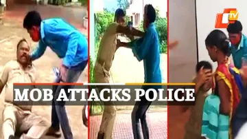 MOB ATTACKS POLICE