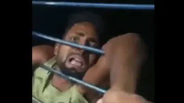 Mobile thief caught, left hanging outside running train #Watch 