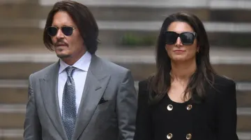 Jhonny Depp with his lawyer 