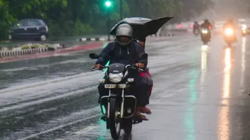 Motorist on a rainy day in Bhubaneswar