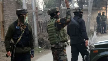 Security personnel at an encounter site in J&K