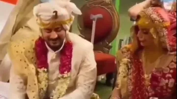 Bride, groom start fight on stage