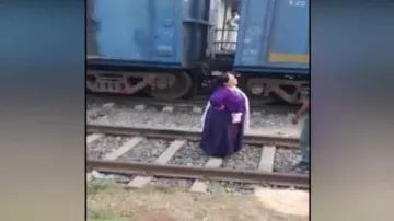 Woman halts train
