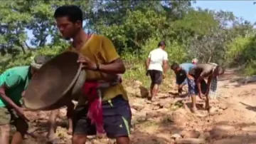 Govt 'turns blind', Odisha villagers take up road construction on their own