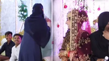 ‘Burqa wali’ hugs and kisses groom, watch how bride reacts #Watch