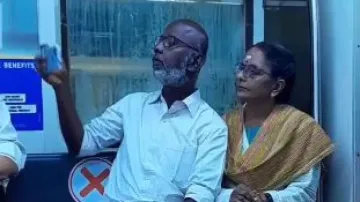 Elderly couple struggles to take selfie in running metro, wins hearts of netizens; watch