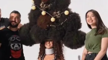 Internet furious with Syrian hairstylist who sets Guinness World Record for 'highest' hairstyle; wat