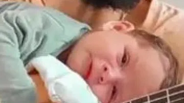Watch: Baby’s priceless reaction as father sings lullaby 