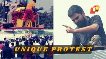 Odisha youth climbs atop hoarding after failing to meet CM, rescued