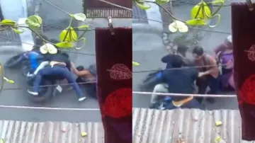 Brave girl fights back against chain snatchers, gets dragged on road