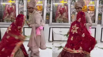Bride and groom 'beat' each other during this wedding ritual