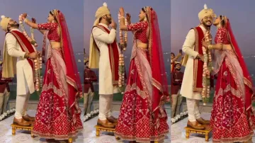 Groom demands a kiss from bride before varmala