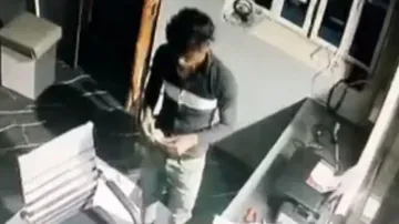Dancing Thief! Man chews gutkha, dances after stealing laptop, cash; CCTV footage goes viral