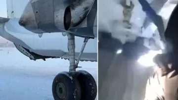 Flight door opens mid-air; internet shocked as man keeps smiling, records video