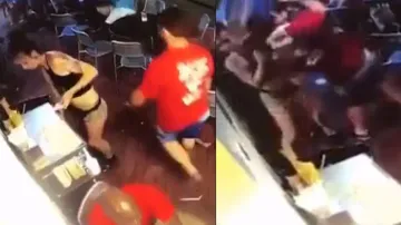 Youth inappropriately touches waitress, watch what happens next
