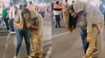 Caring girlfriend carries drunk boyfriend on her back, video goes viral