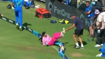 Pakistani TV anchor falls down after fielder crashes with her