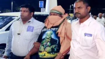 Accused Gopal Das at airport