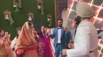 Bride, groom dance to ‘Calm Down’ at their wedding, adorable video goes viral